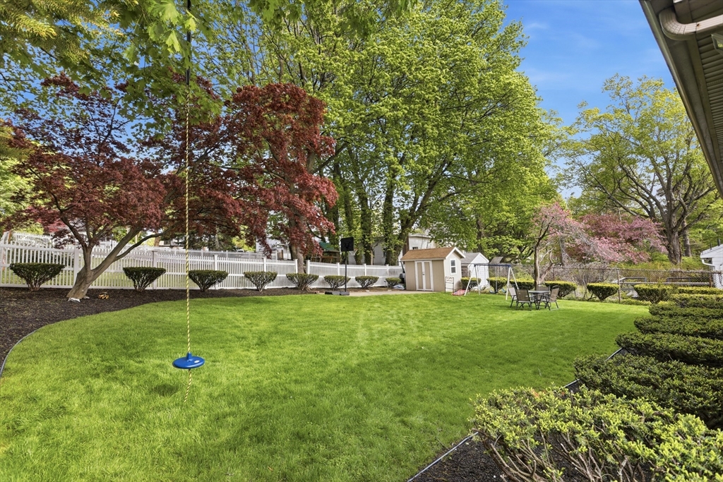 115 Collincote Street Stoneham, MA 02180 - Photo 21 of 25 a view of a park with large trees