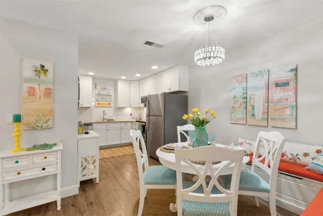 a view of a dining room with furniture