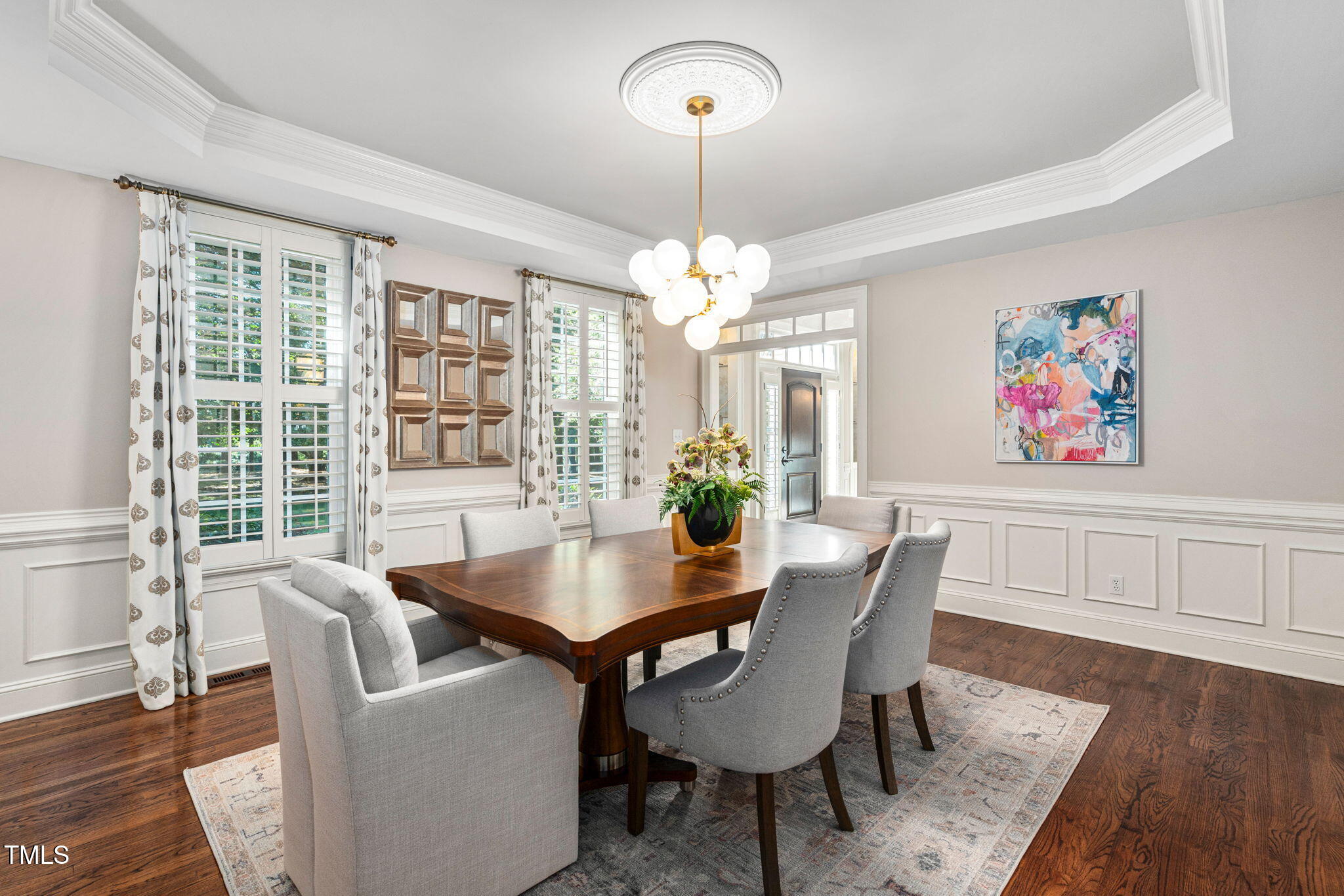 12012 Six Forks Road Raleigh, NC 27614 - Photo 18 of 100 a dining room with furniture a window and wooden floor