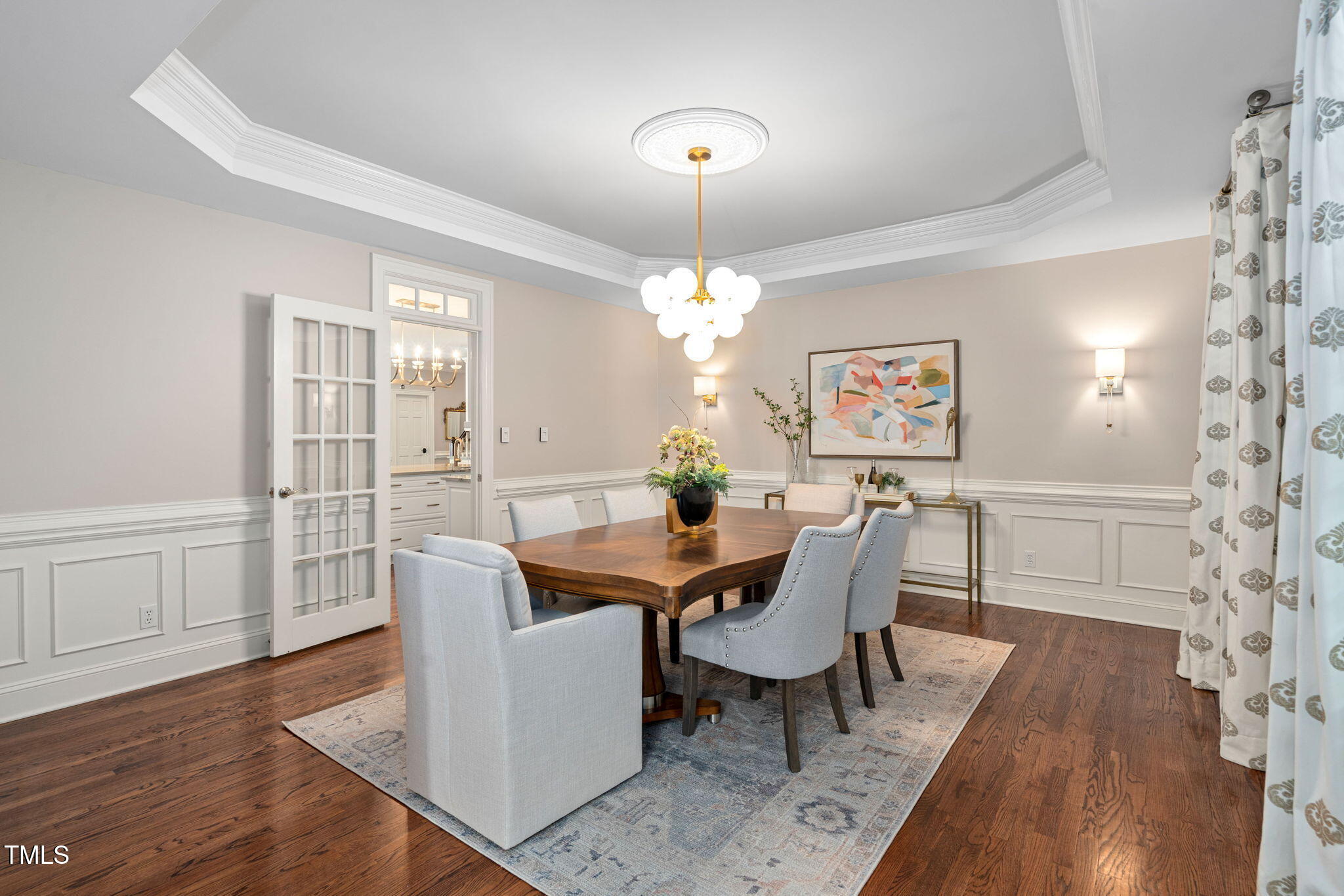 12012 Six Forks Road Raleigh, NC 27614 - Photo 19 of 100 a view of a dining room with furniture window and wooden floor