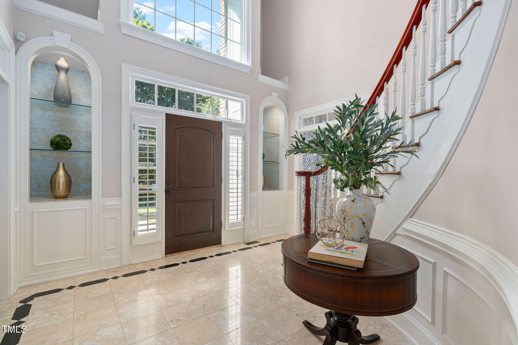 12012 Six Forks Road Raleigh, NC 27614 - Photo 5 of 100 a living room with furniture and a potted plant