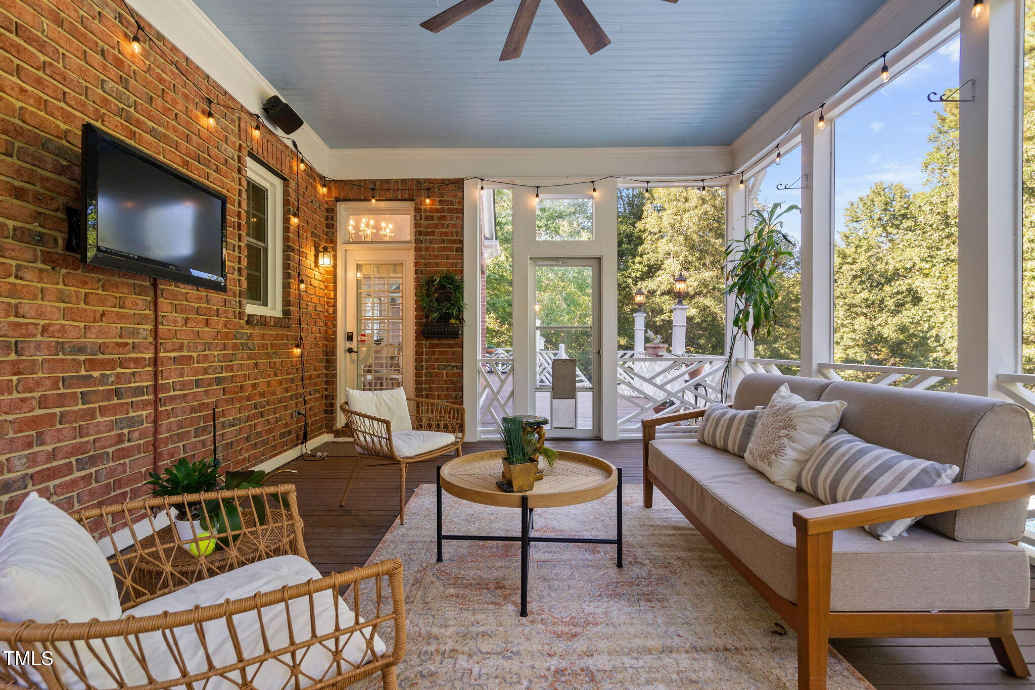 12012 Six Forks Road Raleigh, NC 27614 - Photo 81 of 100 a living room with furniture tv and a large window