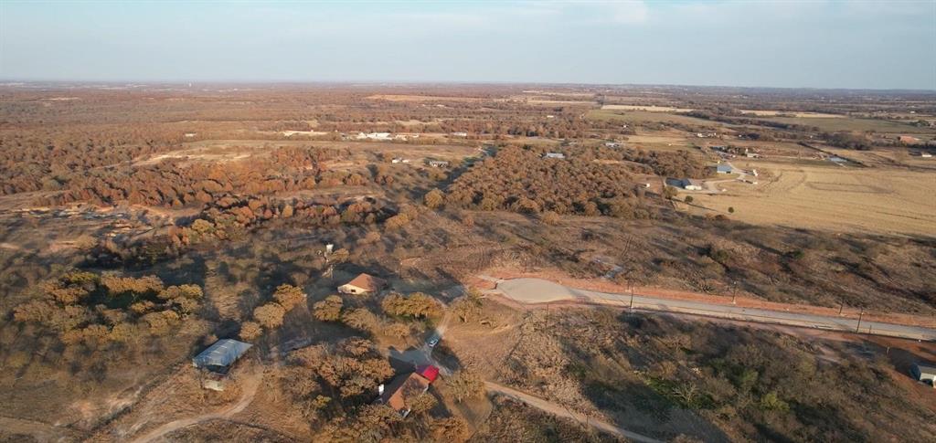 1052 Carnagie Road Poolville, TX 76487 - Photo 5 of 7 a view of city and ocean