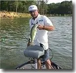 a picture of a bathroom with a shower