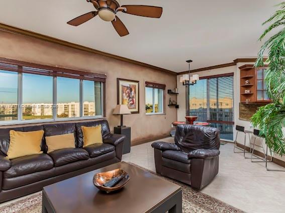 10700 Northwest 66th Street, Unit 508 Doral, FL 33178 - Photo 11 of 17 a living room with furniture and a large window