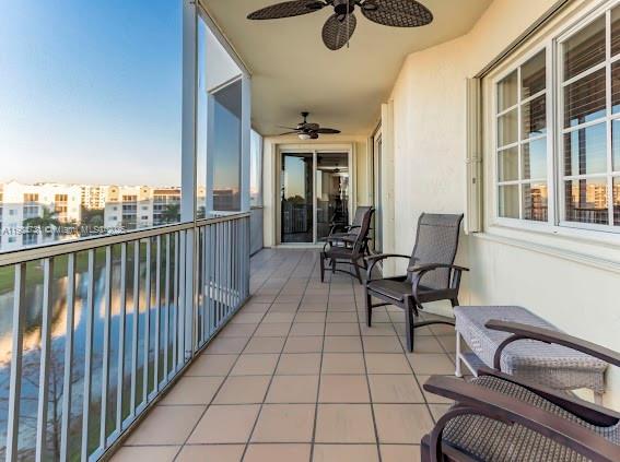 10700 Northwest 66th Street, Unit 508 Doral, FL 33178 - Photo 16 of 17 a view of a balcony and chairs