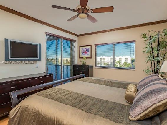 10700 Northwest 66th Street, Unit 508 Doral, FL 33178 - Photo 6 of 17 a bedroom with a bed and a flat screen tv