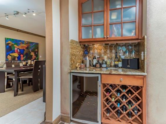 10700 Northwest 66th Street, Unit 508 Doral, FL 33178 - Photo 9 of 17 a kitchen with a sink and cabinets