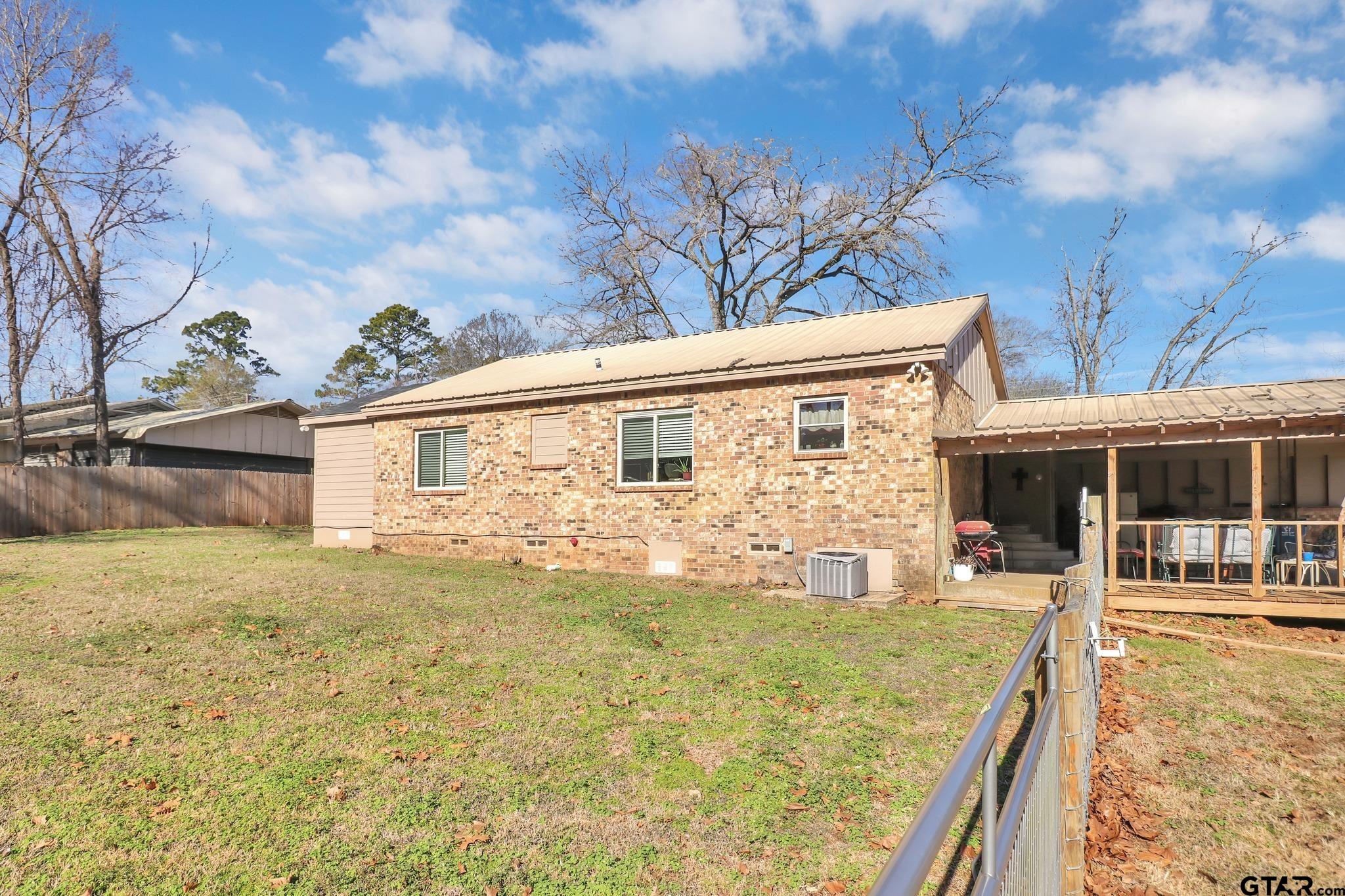 554 East San Antonio Street Alto, TX 75925 - Photo 28 of 28 a view of a house with a yard