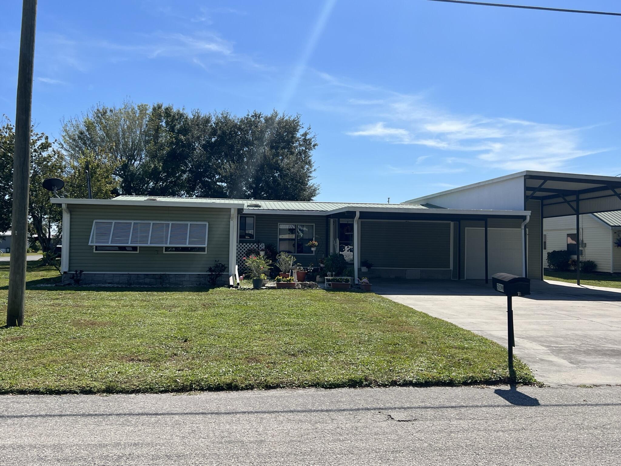 1017 Jordan Loop Okeechobee, FL 34974 - Photo 1 of 28 FRONT VIEW