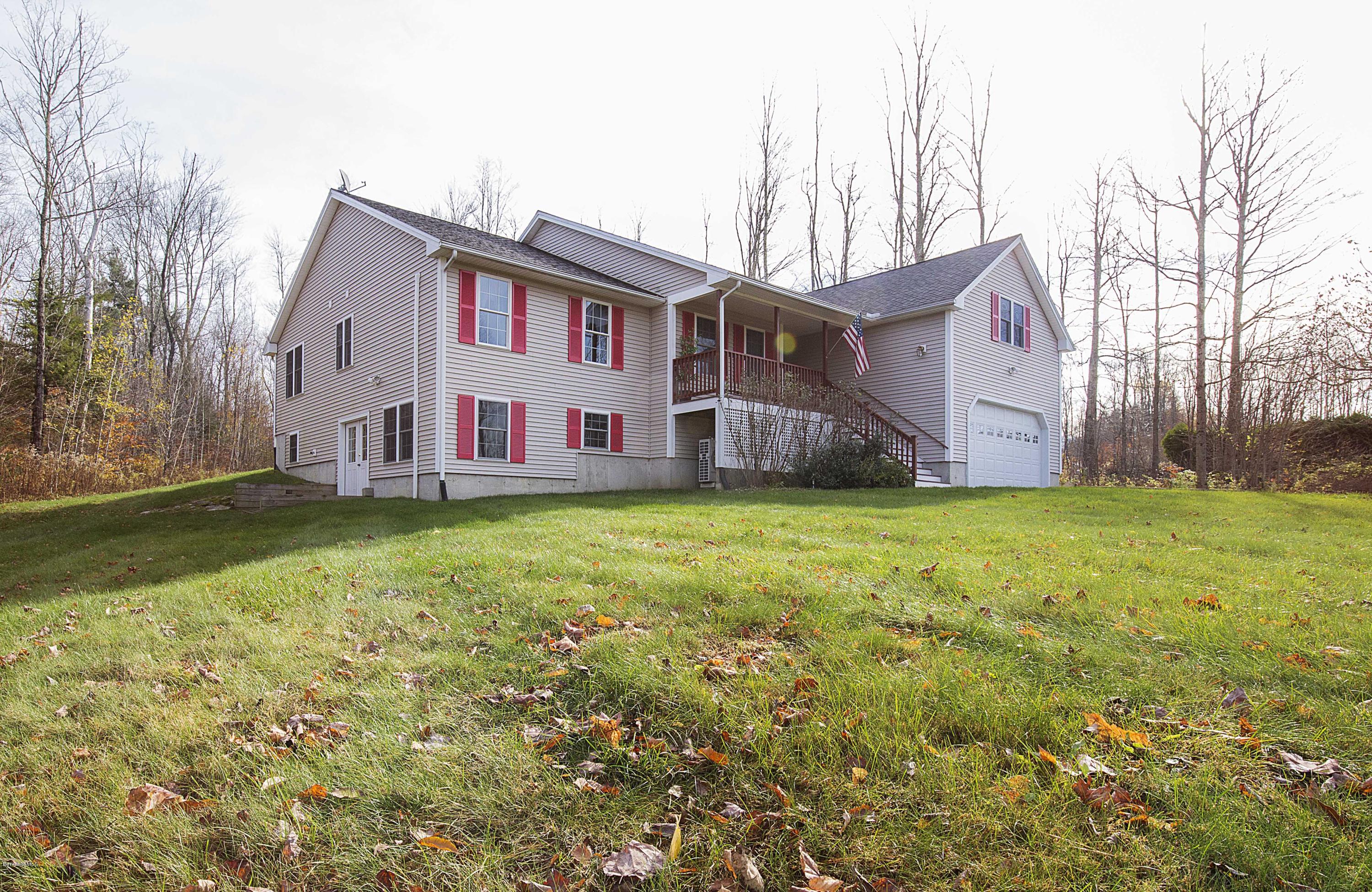 297 Cummington Road Ashfield, MA 01330 - Photo 1 of 27 a view of a house with backyard