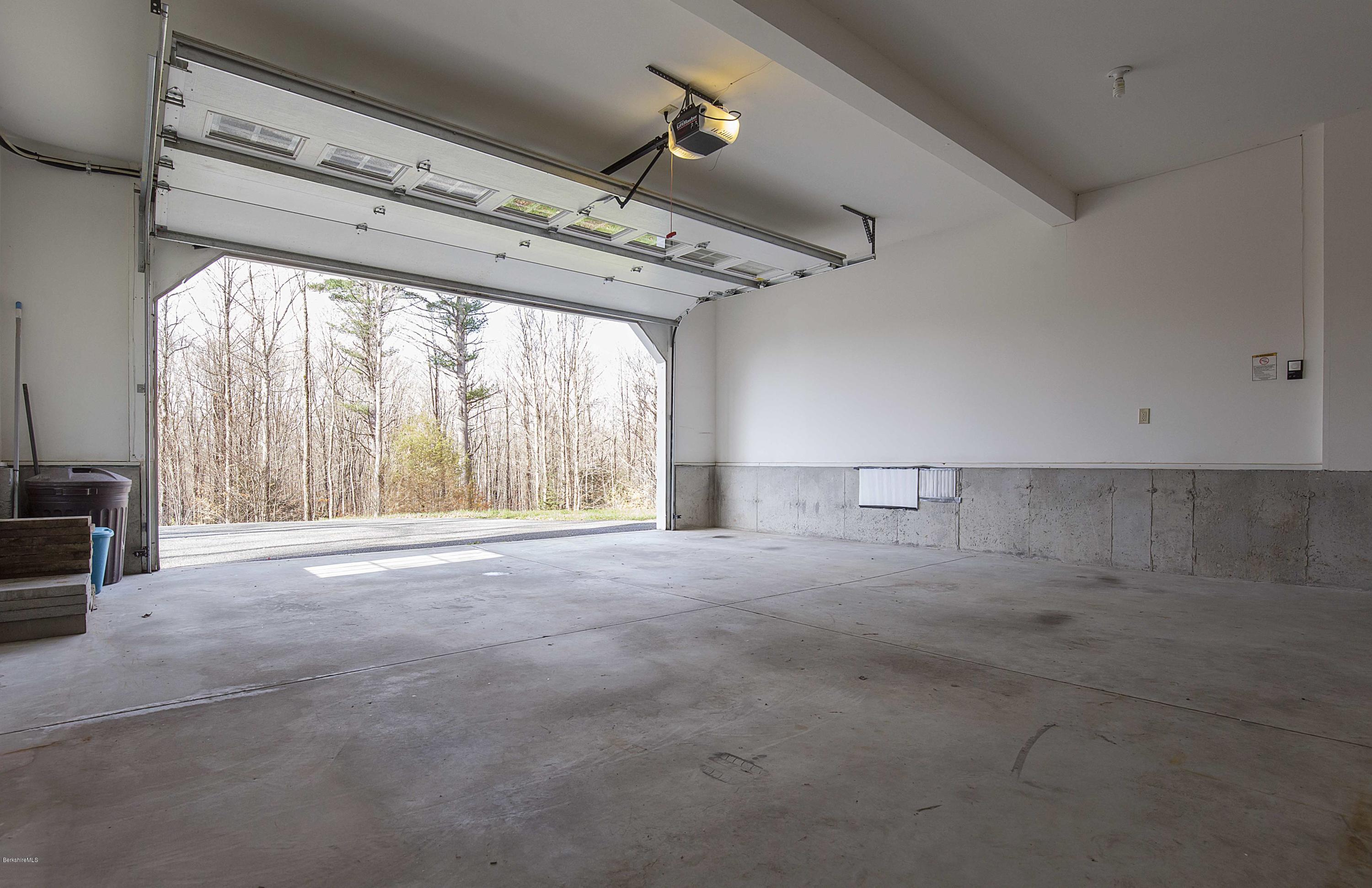 297 Cummington Road Ashfield, MA 01330 - Photo 22 of 27 a view of an empty room with a window