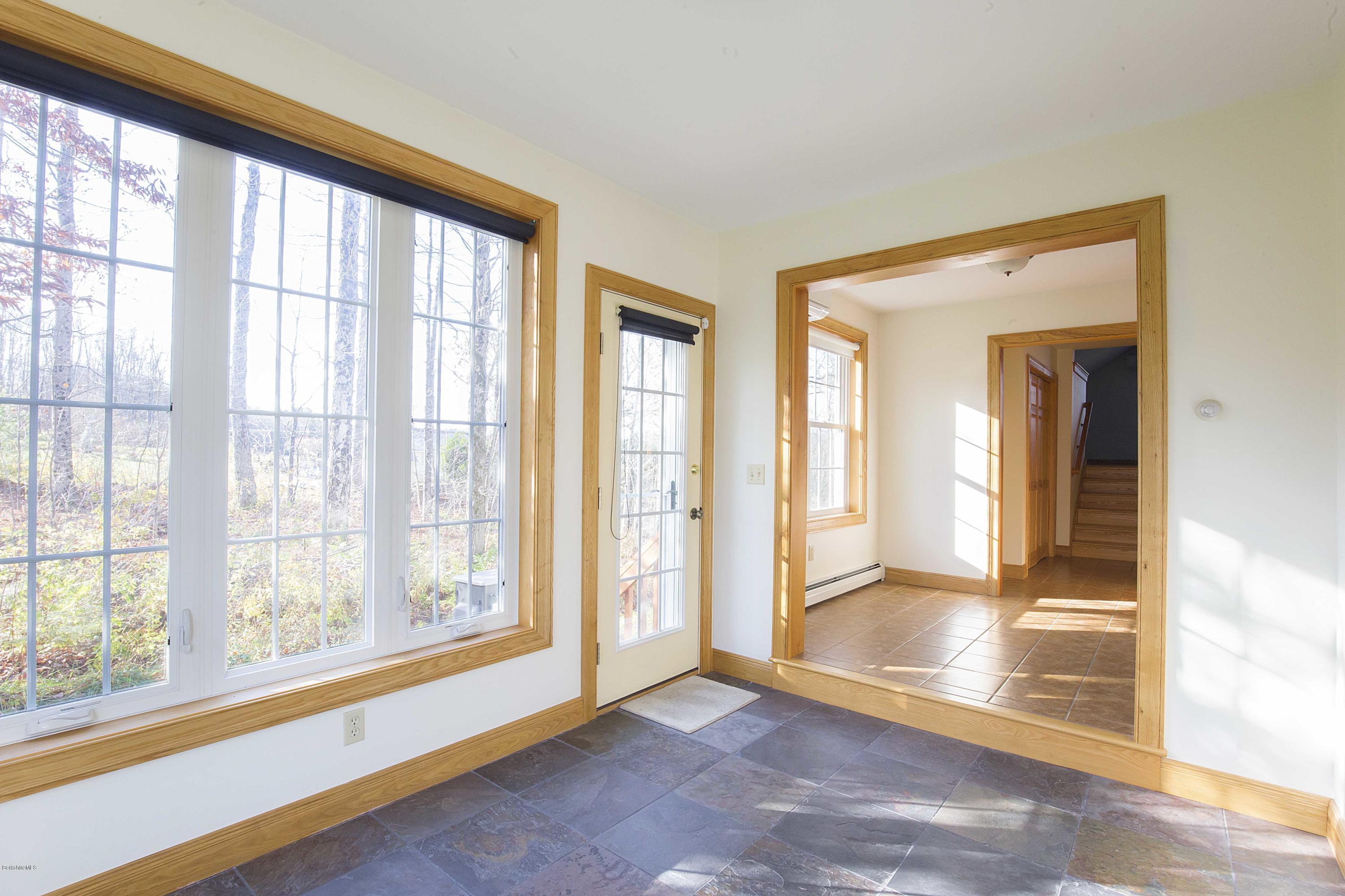 297 Cummington Road Ashfield, MA 01330 - Photo 6 of 27 wooden floor in an empty room with a window