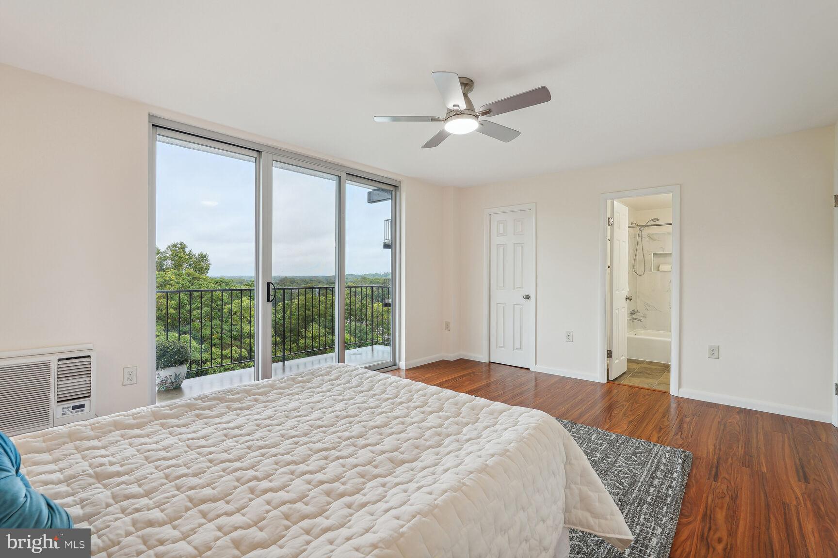 3245 Rio Drive, Unit 915 Falls Church, VA 22041 - Photo 12 of 31 a bedroom with a large bed and a window