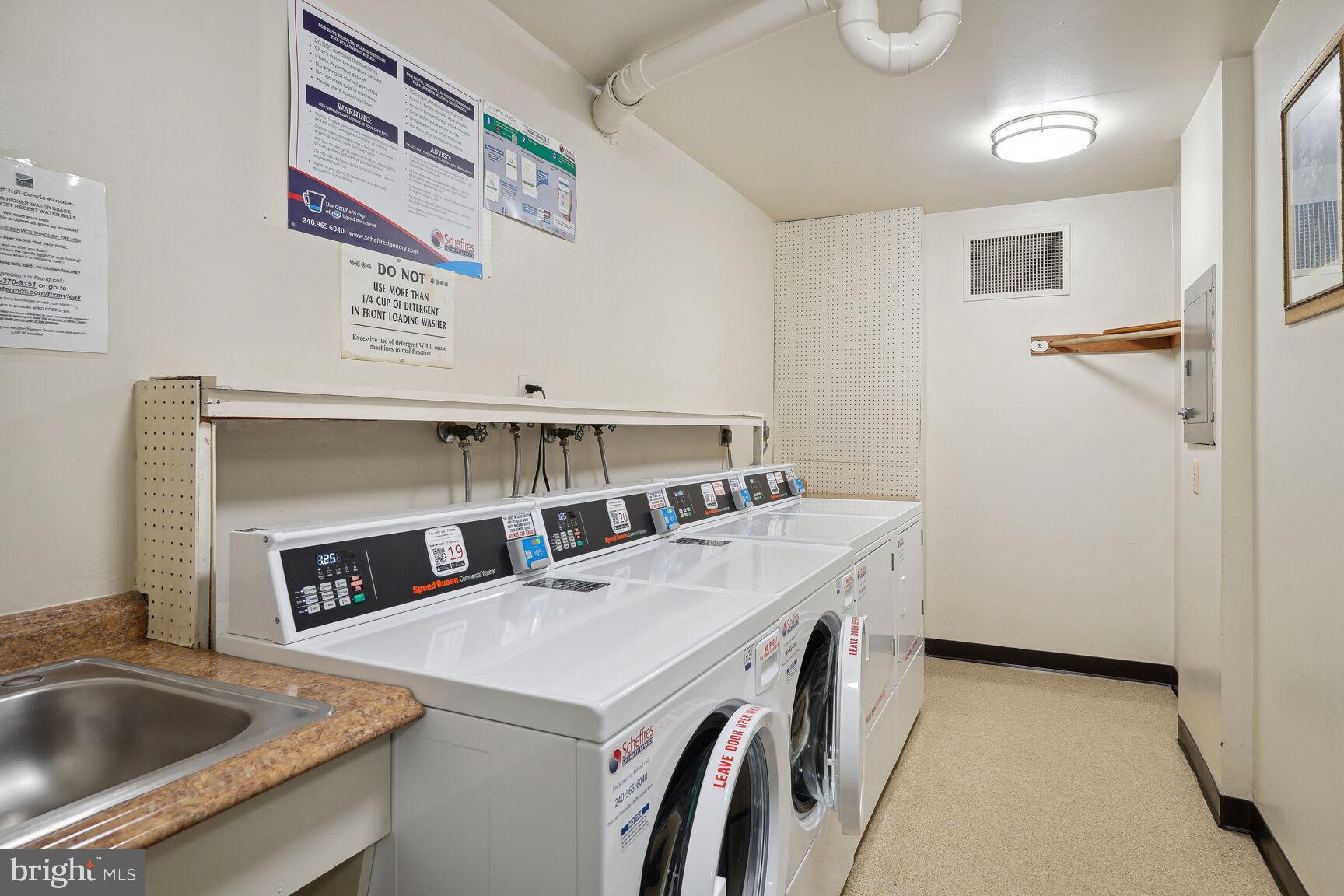 3245 Rio Drive, Unit 915 Falls Church, VA 22041 - Photo 22 of 31 a utility room with dryer and washer