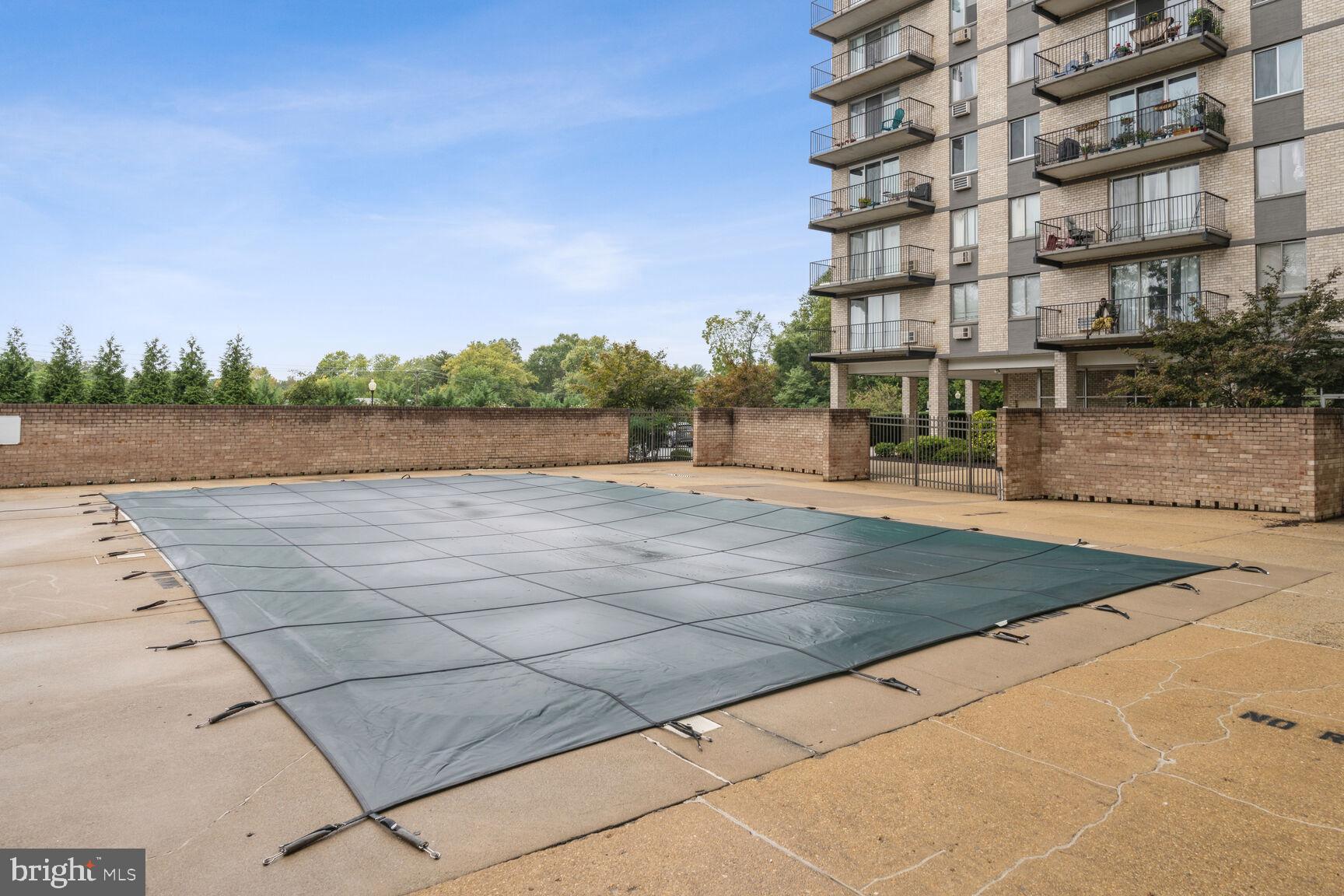3245 Rio Drive, Unit 915 Falls Church, VA 22041 - Photo 26 of 31 a view of an ocean with a building in the background