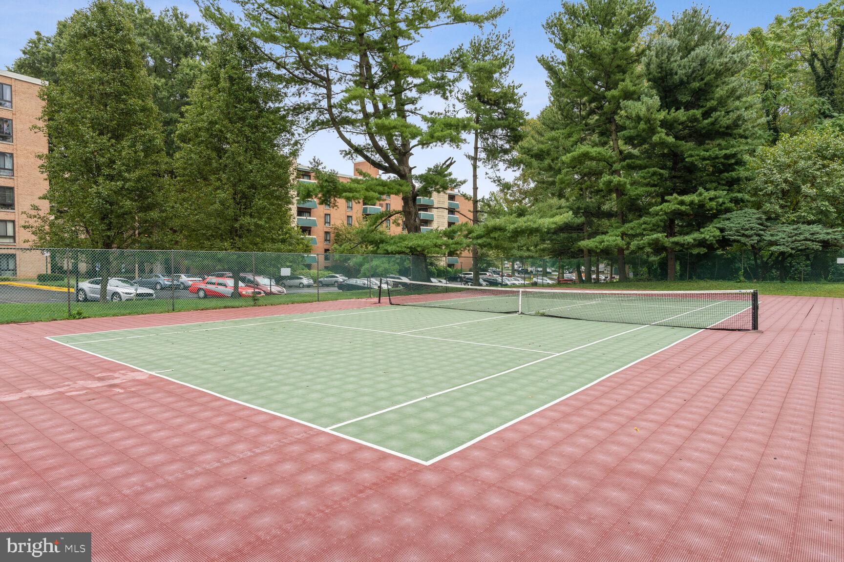 3245 Rio Drive, Unit 915 Falls Church, VA 22041 - Photo 29 of 31 a view of a tennis court