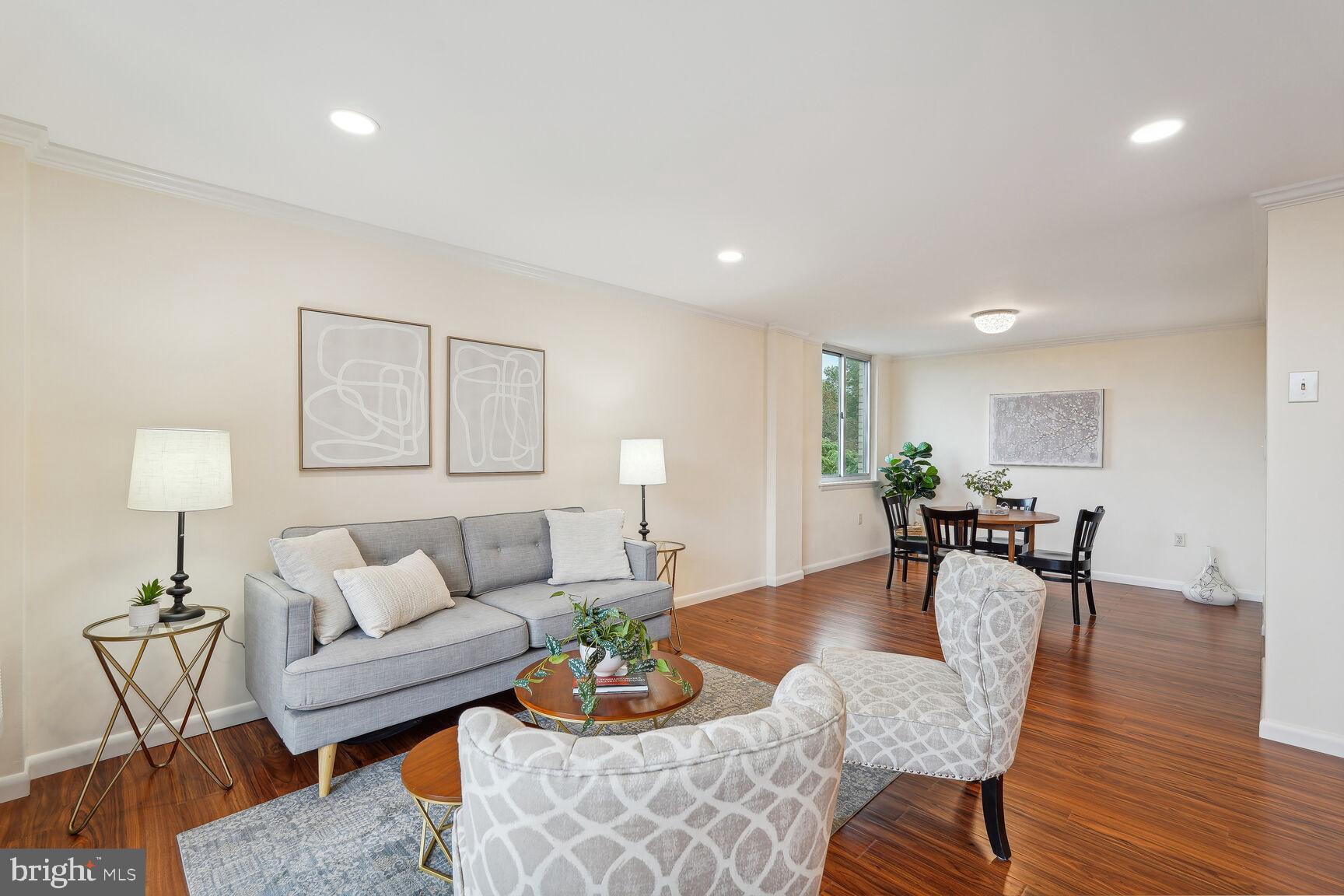 3245 Rio Drive, Unit 915 Falls Church, VA 22041 - Photo 31 of 31 a living room with furniture and a table