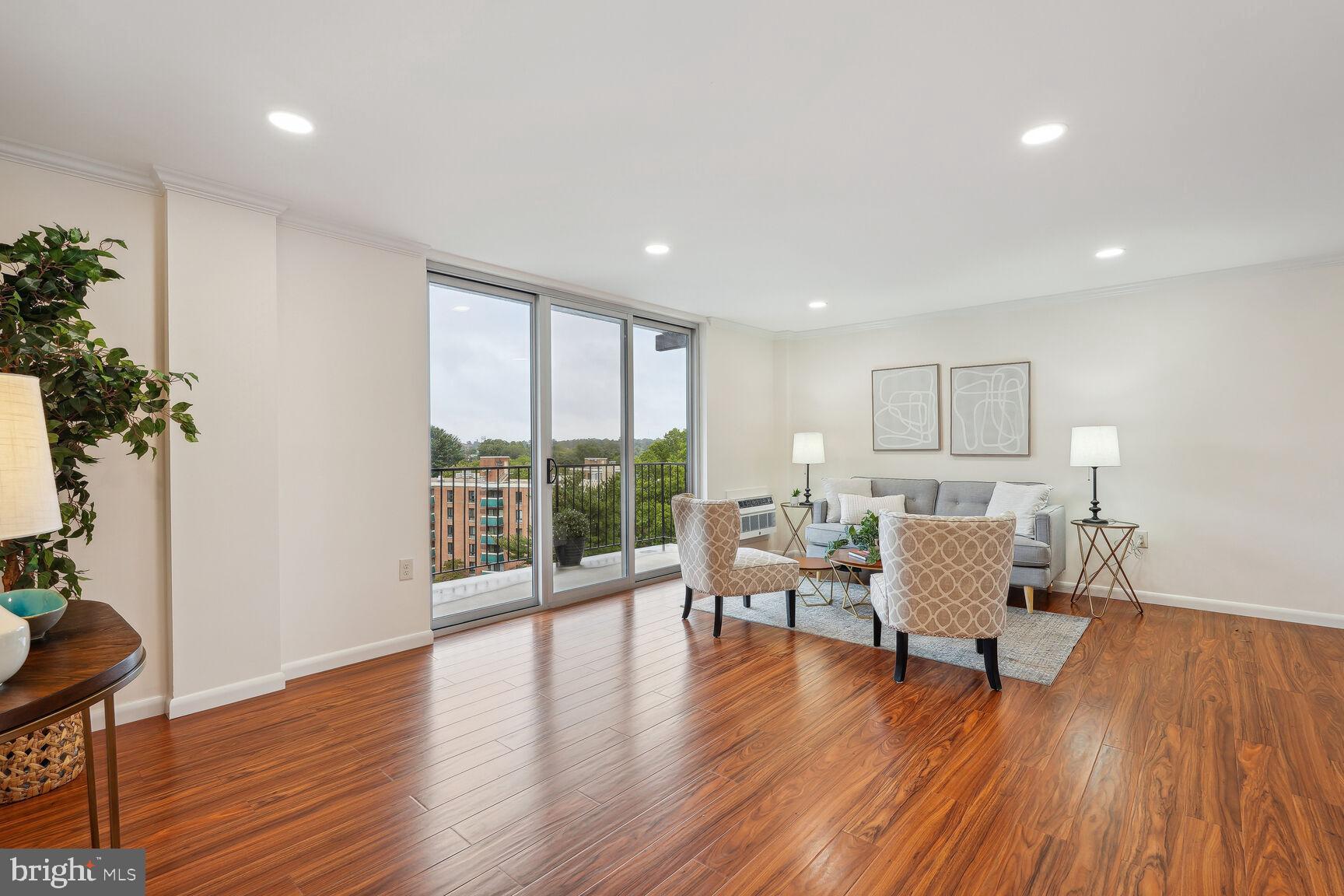 3245 Rio Drive, Unit 915 Falls Church, VA 22041 - Photo 3 of 31 a living room with furniture and wooden floor