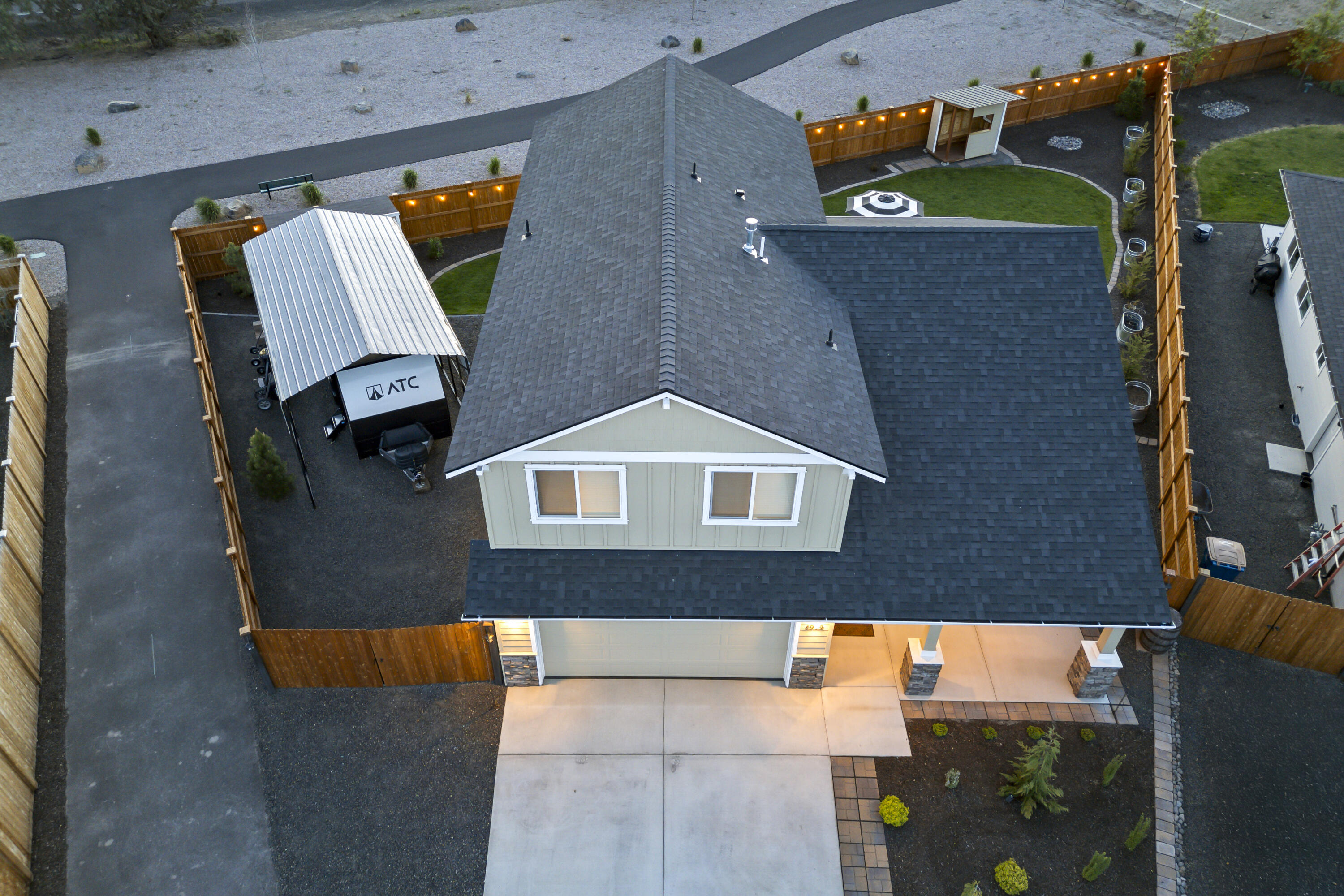 4999 Southwest Yew Place Redmond, OR 97756 - Photo 47 of 50 an aerial view of a house with yard and garage