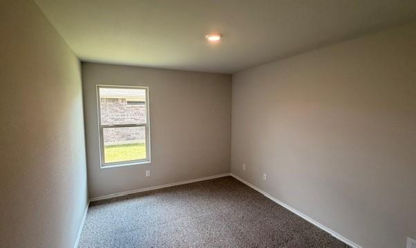 232 Blanco Drive Azle, TX 76020 - Photo 9 of 11 a view of an empty room with a window
