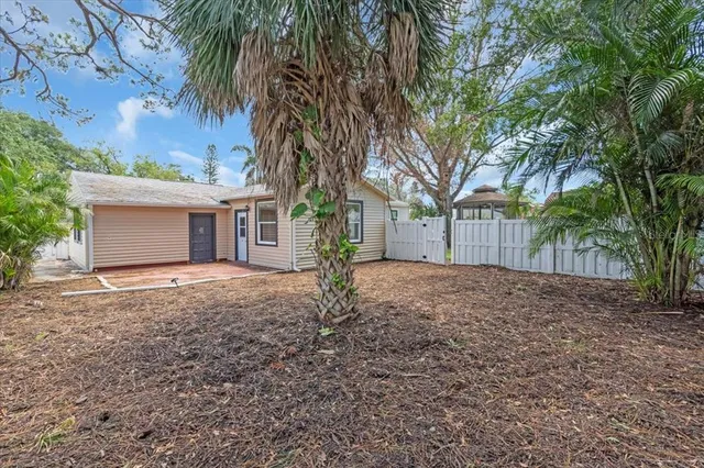 front view of a house with a trees
