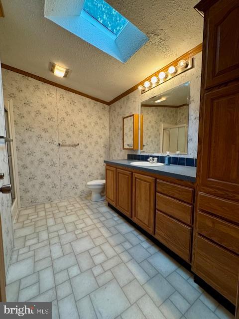 16 Doe Drive Elkton, MD 21921 - Photo 14 of 32 a bathroom with a sink a mirror and a shower