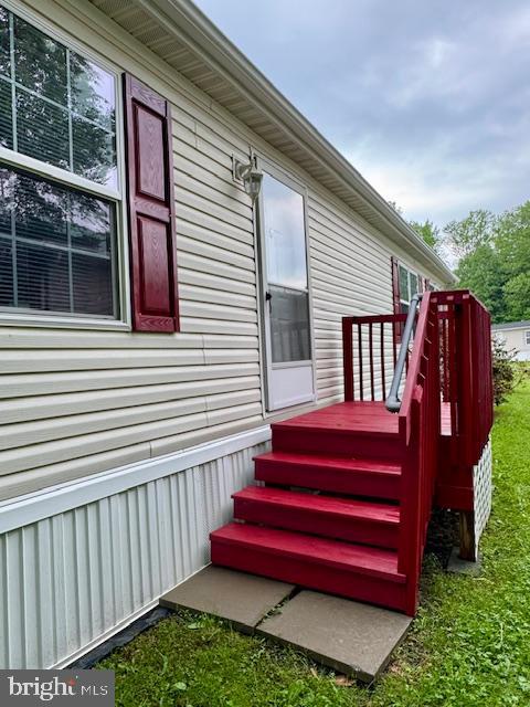 16 Doe Drive Elkton, MD 21921 - Photo 24 of 32 a view of a wooden bench sitting in front of a building