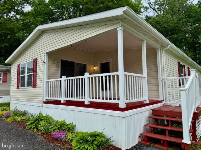 16 Doe Drive Elkton, MD 21921 - Photo 3 of 32 a front view of a house with a garden