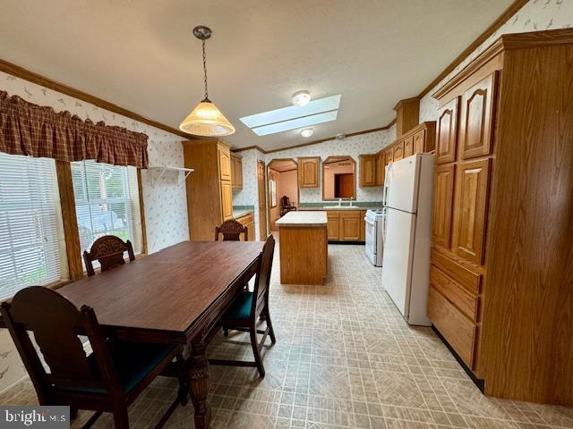 16 Doe Drive Elkton, MD 21921 - Photo 10 of 32 a dining room with furniture a chandelier and wooden floor