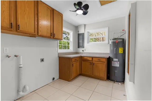 a view of a house with swimming pool and porch