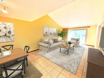 a kitchen with stainless steel appliances a stove a sink and a microwave