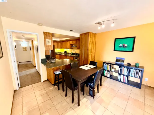 a kitchen with stainless steel appliances a sink stove and microwave