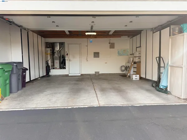 a view of a house with a yard and garage