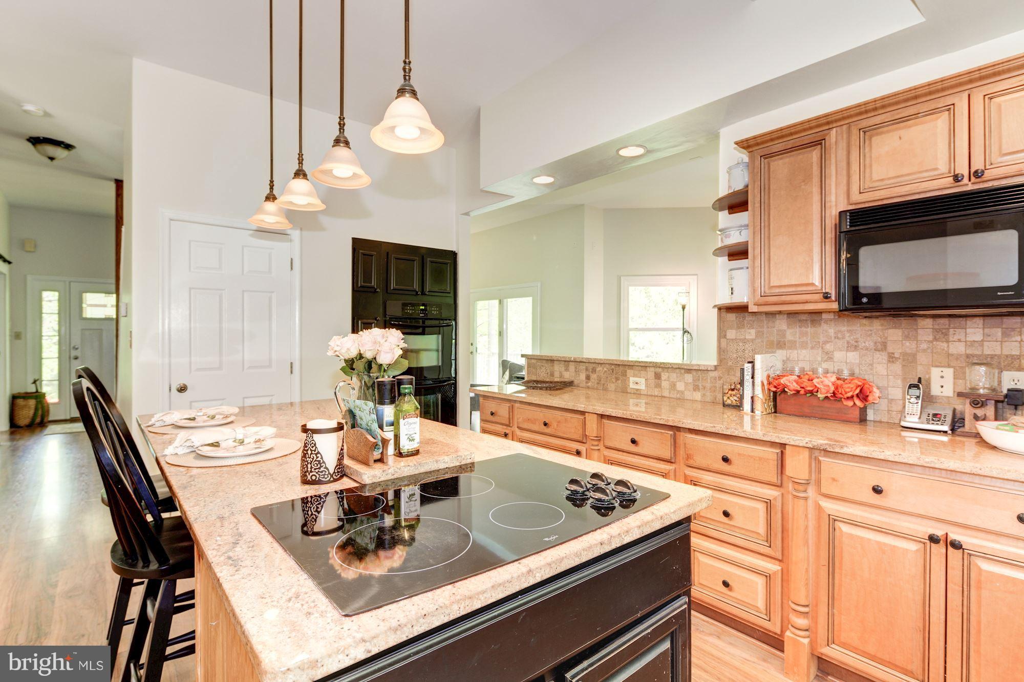 2307 Laurel Bush Road Abingdon, MD 21009 - Photo 17 of 45 Gourmet Kitchen Island with Cooktop & Seating