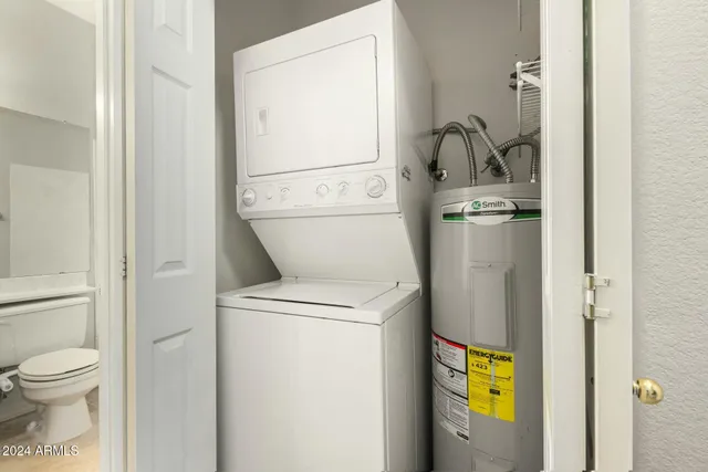 a bathroom with a toilet and a sink
