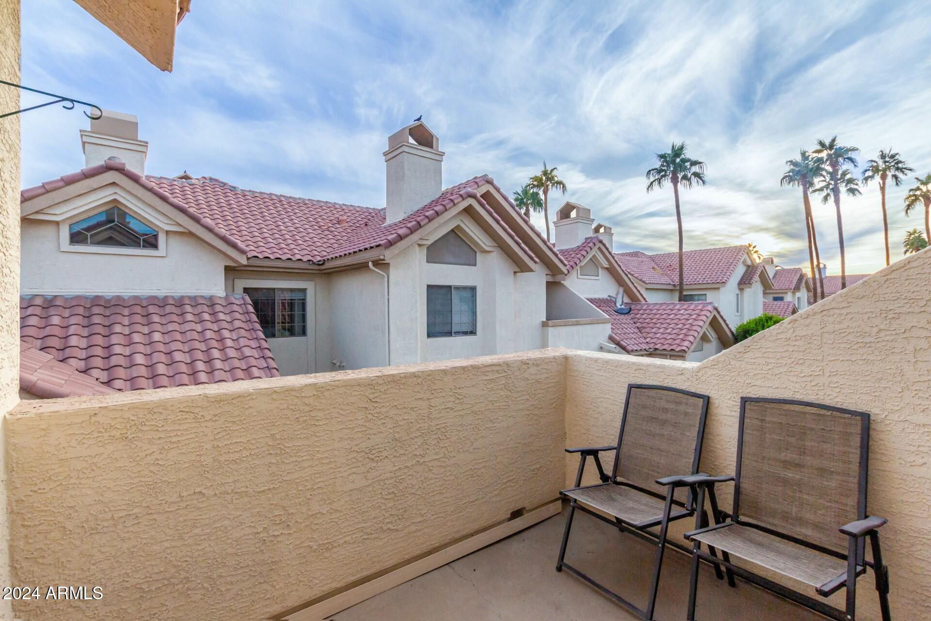 2801 North Litchfield Road, Unit 18 Goodyear, AZ 85395 - Photo 18 of 21 a view of a house with roof deck