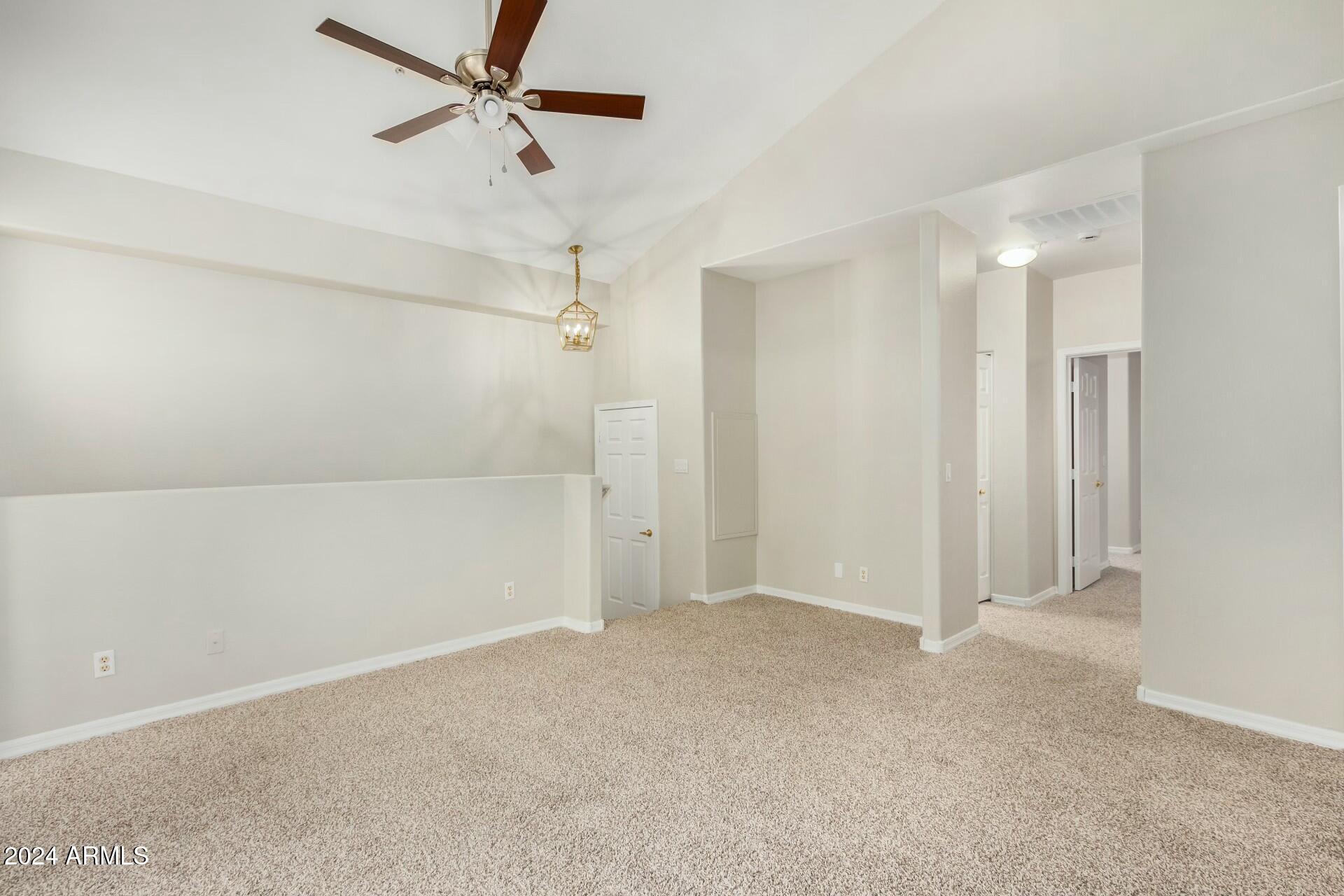 2801 North Litchfield Road, Unit 18 Goodyear, AZ 85395 - Photo 7 of 21 wooden floor in an empty room