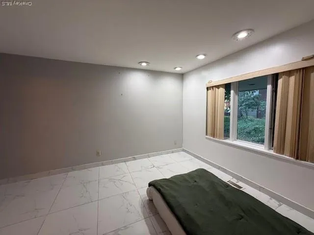 a bathroom with a sink a mirror and a shower