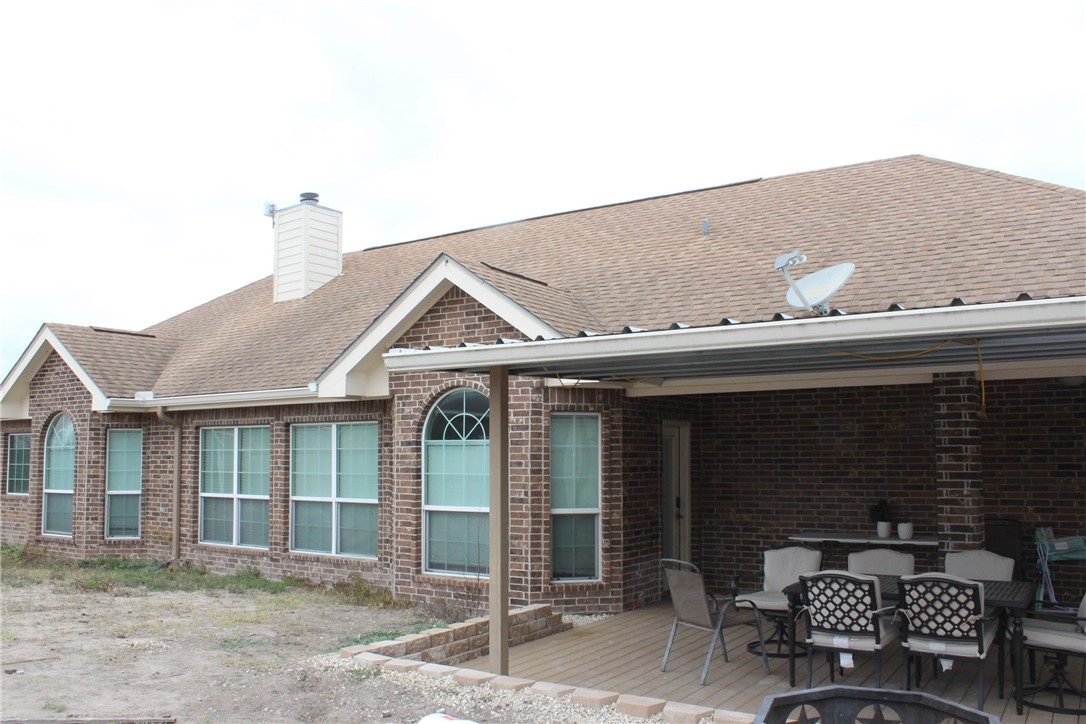 137 Lk Vw Terrace Three Rivers, TX 78071 - Photo 16 of 20 a front view of a house with glass windows
