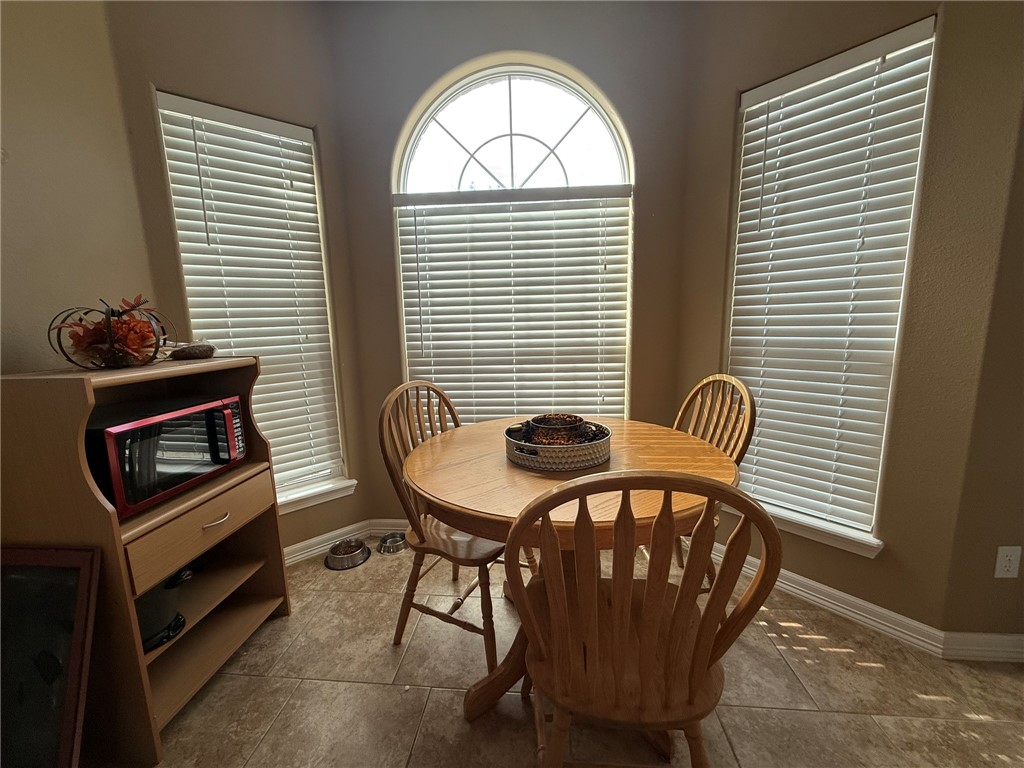 137 Lk Vw Terrace Three Rivers, TX 78071 - Photo 7 of 20 a view of a room that has a table and a chair