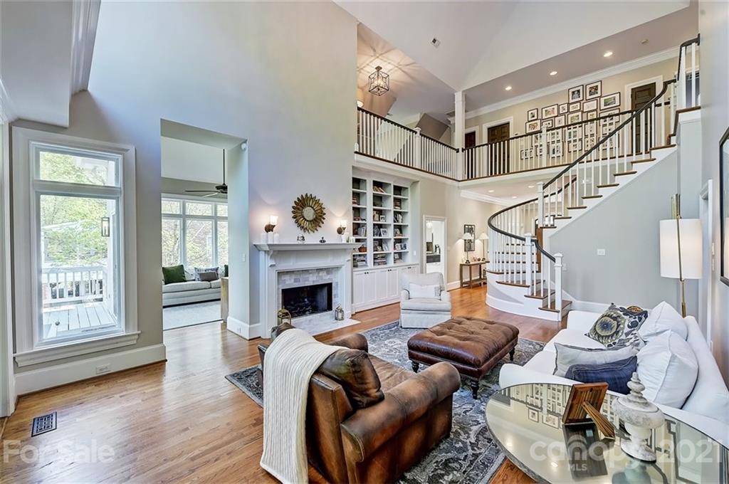 18731 River Falls Drive Davidson, NC 28036 - Photo 2 of 45 a living room with furniture and a fireplace