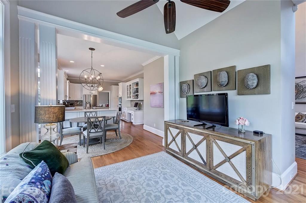 18731 River Falls Drive Davidson, NC 28036 - Photo 11 of 45 a living room with furniture and a flat screen tv