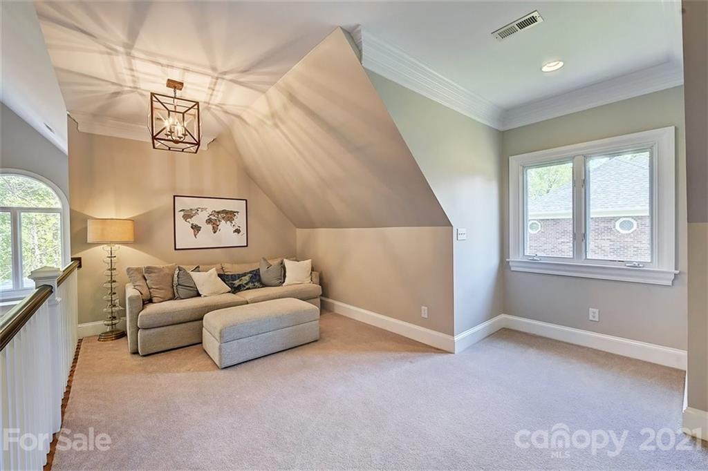 18731 River Falls Drive Davidson, NC 28036 - Photo 25 of 45 a living room with furniture and a window