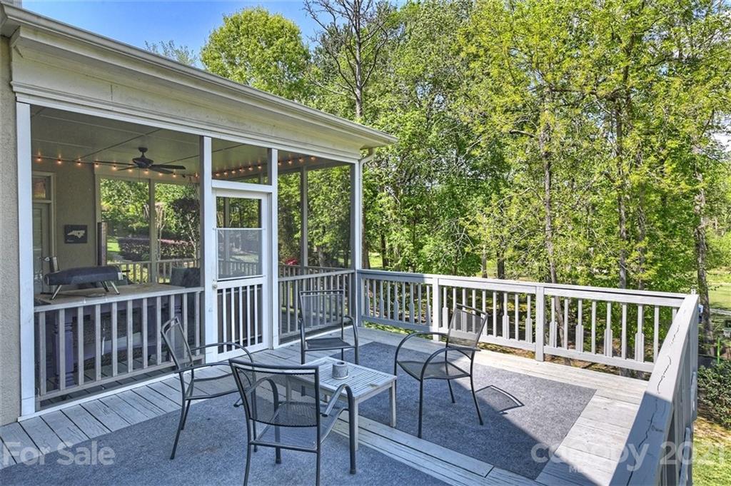 18731 River Falls Drive Davidson, NC 28036 - Photo 40 of 45 a view of a chair and table on the deck
