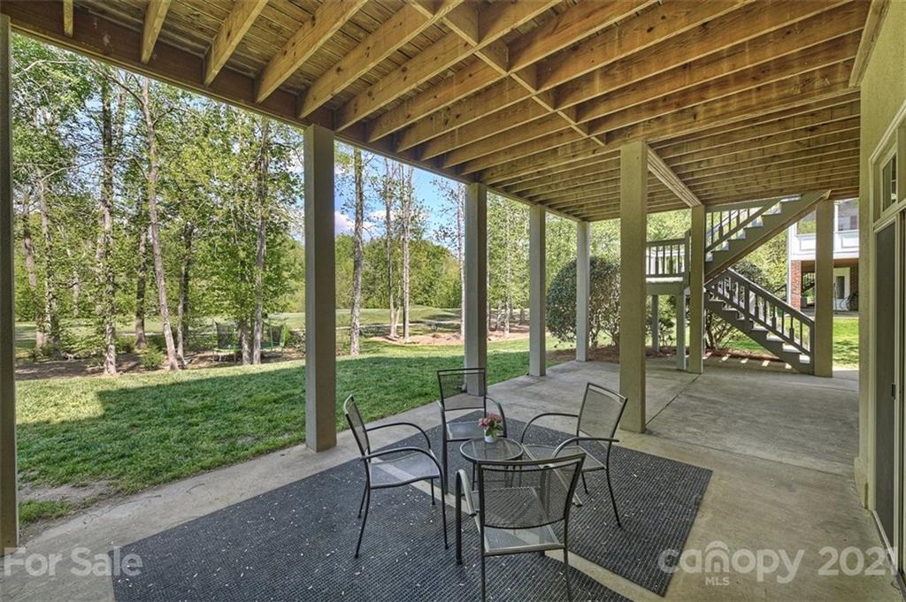 18731 River Falls Drive Davidson, NC 28036 - Photo 42 of 45 a patio with yard glass top table and chairs