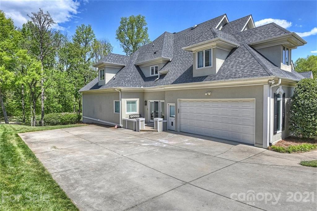 18731 River Falls Drive Davidson, NC 28036 - Photo 44 of 45 front view of a house with a garage