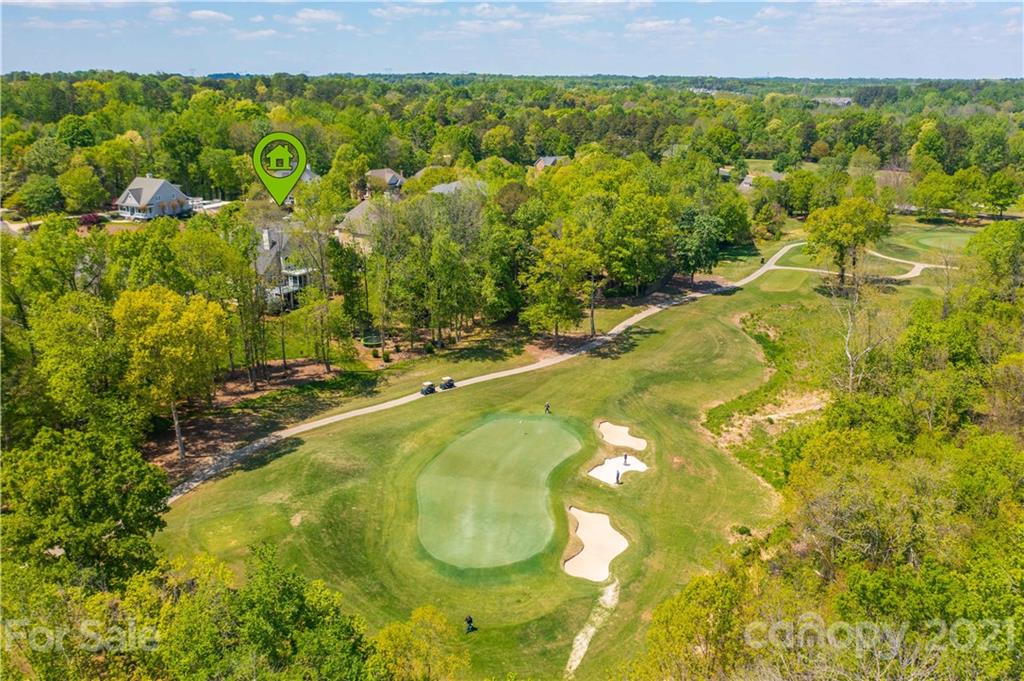 18731 River Falls Drive Davidson, NC 28036 - Photo 6 of 45 a view of swimming pool from a lake