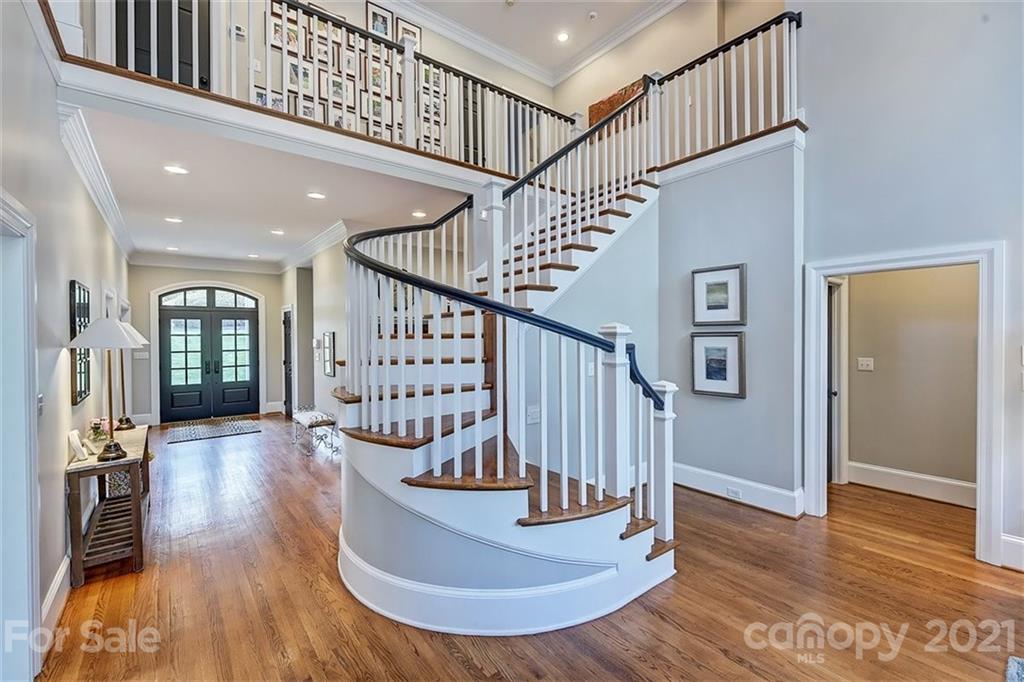 18731 River Falls Drive Davidson, NC 28036 - Photo 7 of 45 a view of entryway and hall with wooden floor