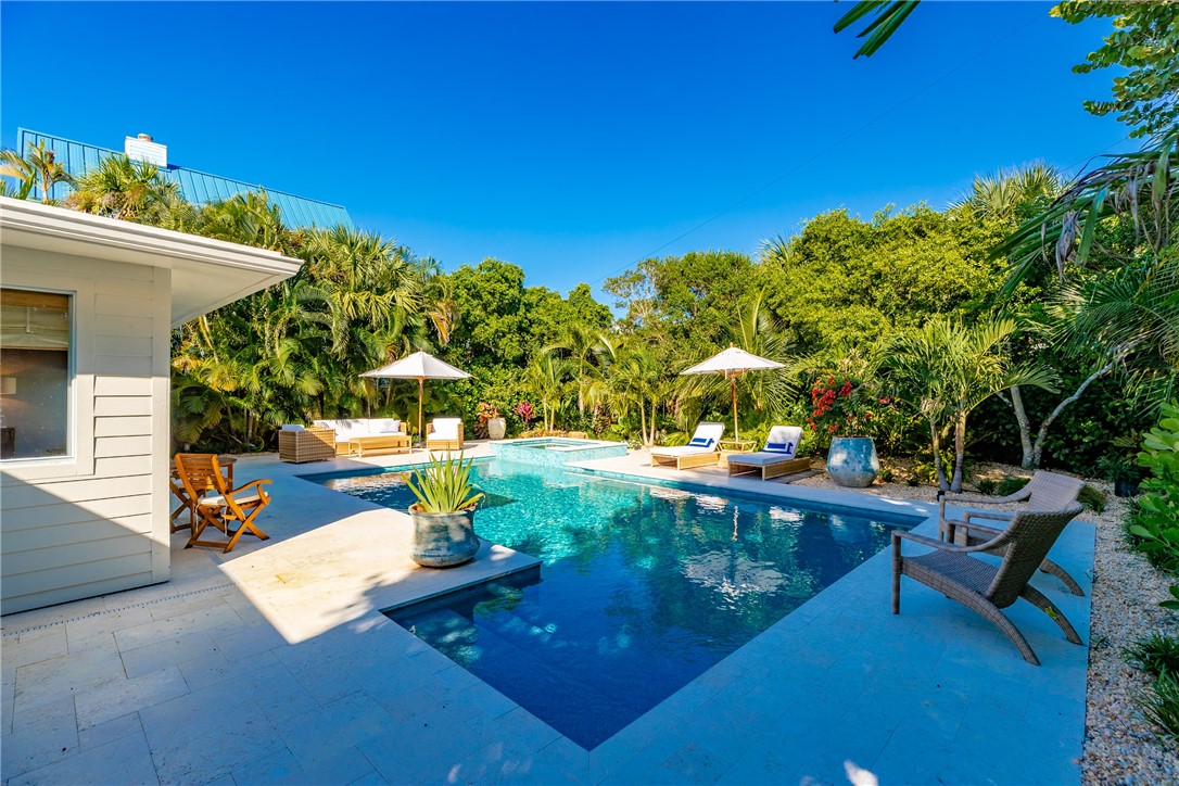 1830 East Sandpiper Road Vero Beach, FL 32963 - Photo 27 of 36 a view of a backyard with sitting area